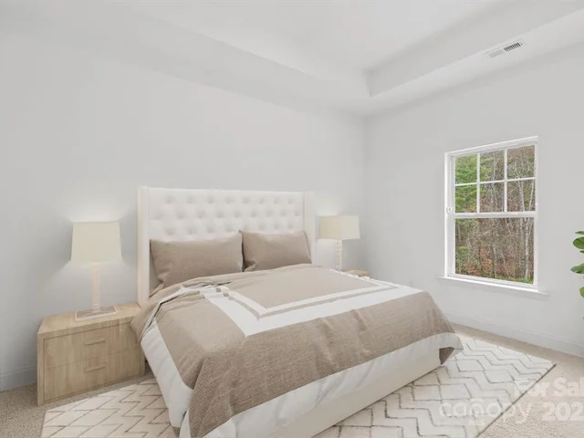 184 Cherry Springs 1B master bedroom staged